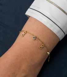 Elegantní zlatý dámský náramek z oceli