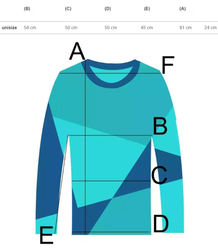 Volný dlouhý svetr s rolákem a oversize pruhy