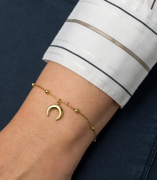 Elegantní zlatý dámský náramek z oceli